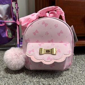 Brand New: UnderOneSky convertible backpack